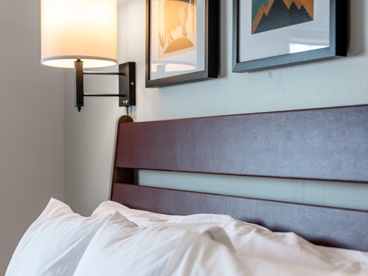 three pillows and artwork