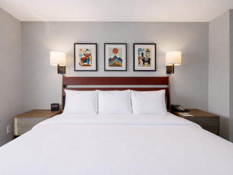 One King bed with white sheets
