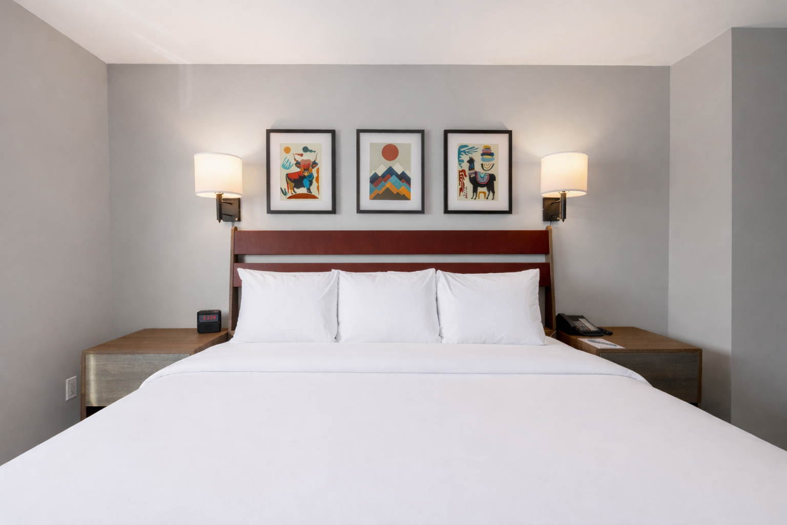 Pictures hanging above bed